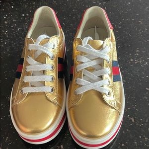 Kids gold Gucci sneakers
